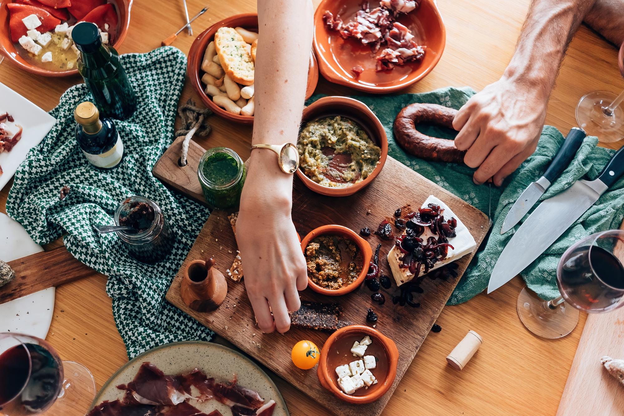 Workshop participants tasting a rustic stew